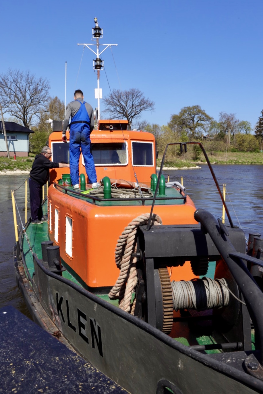 Ferrymen on boat in Świbno